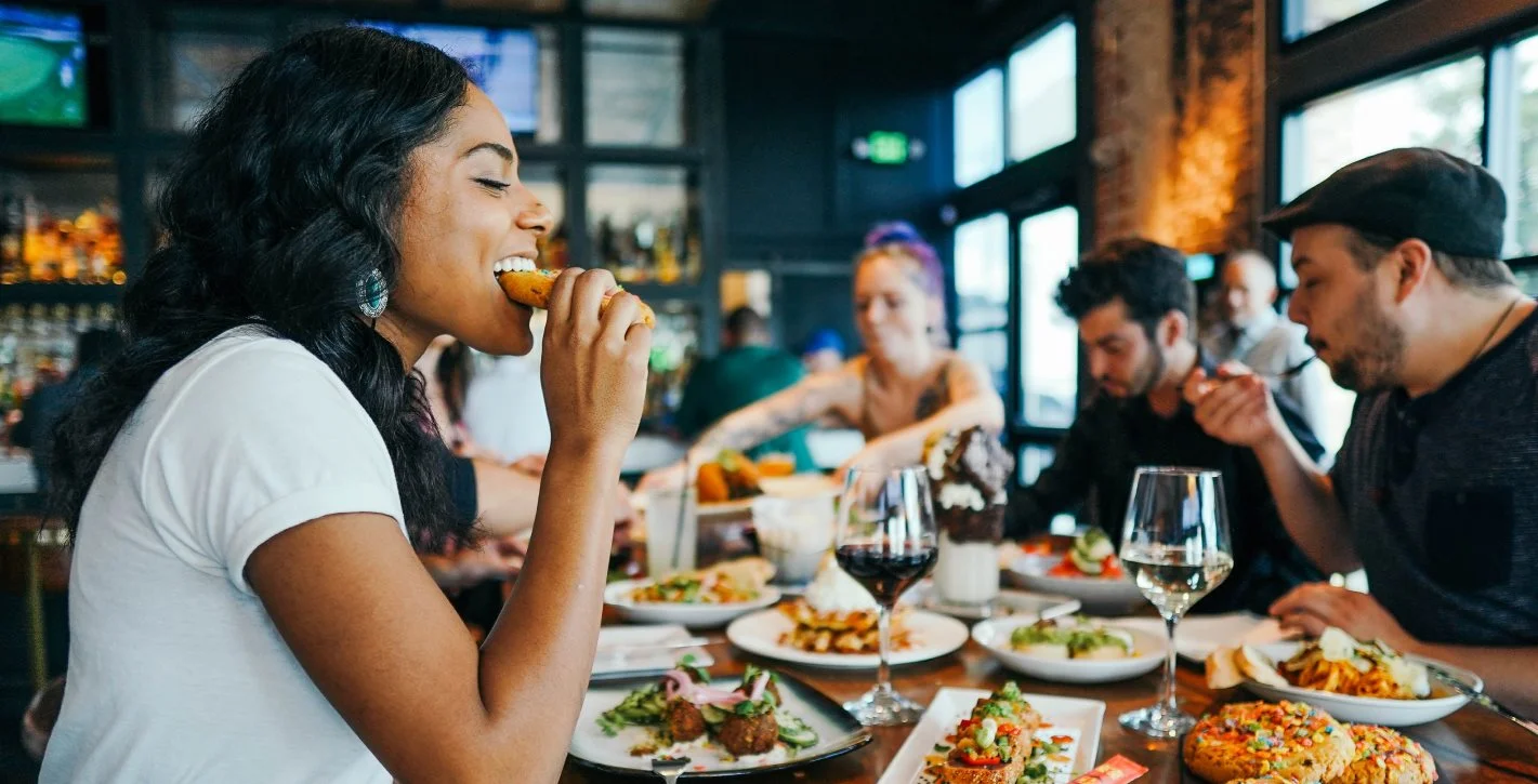 Friends eating at restaurant