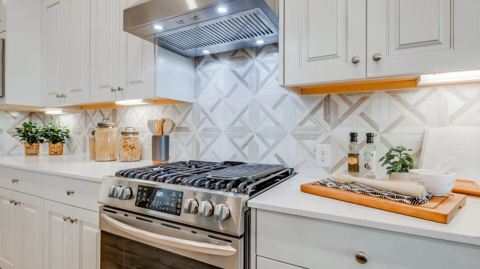 Kimball all-new stainless steel appliances including a gas range with hood