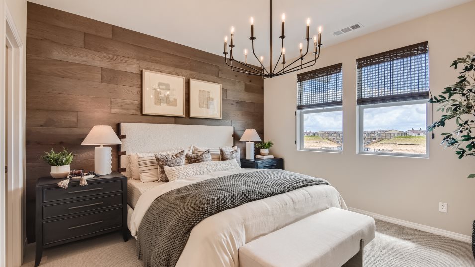 Furnished owner's suite image front of bed