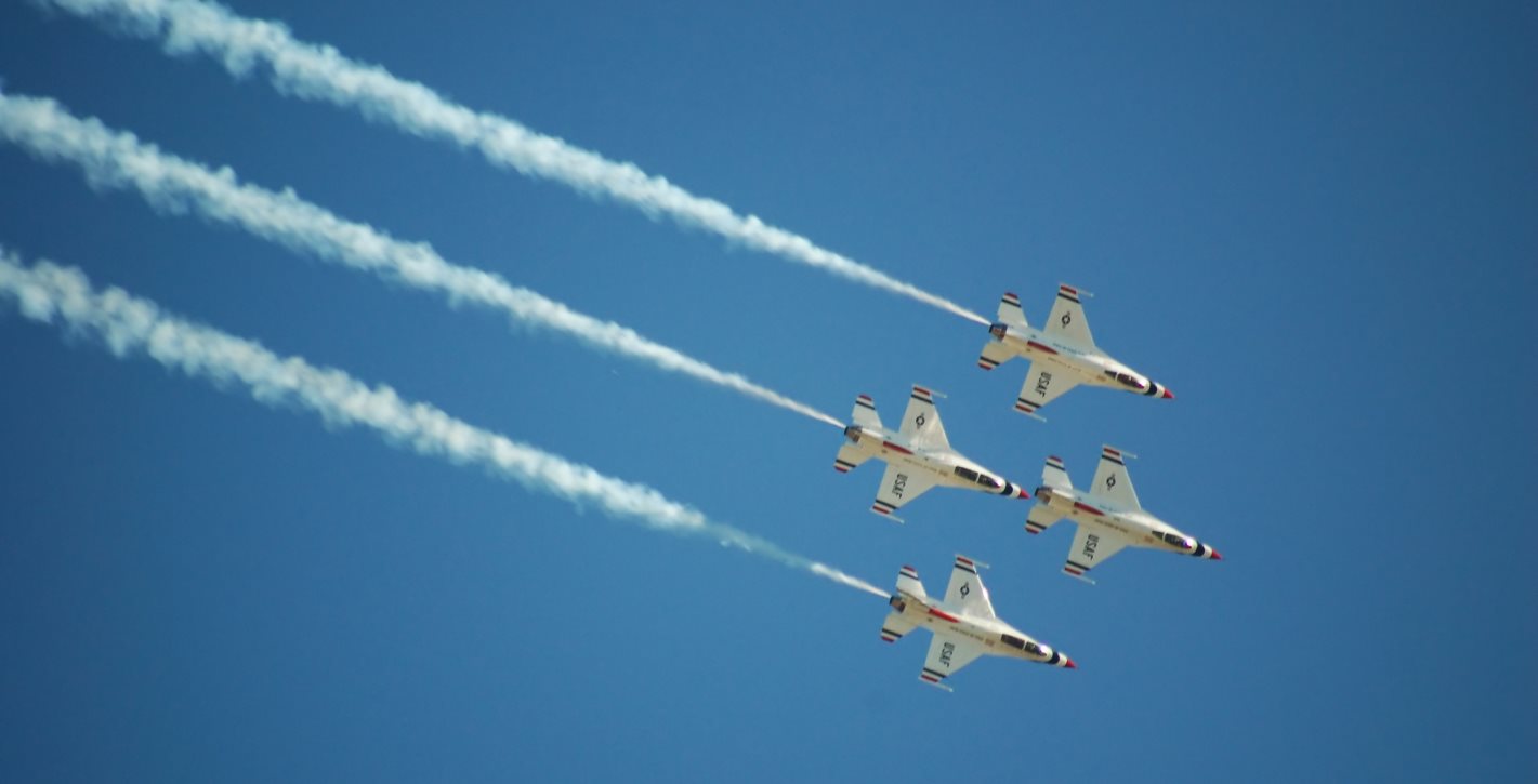 Thunderbird airplanes flying through the sky
