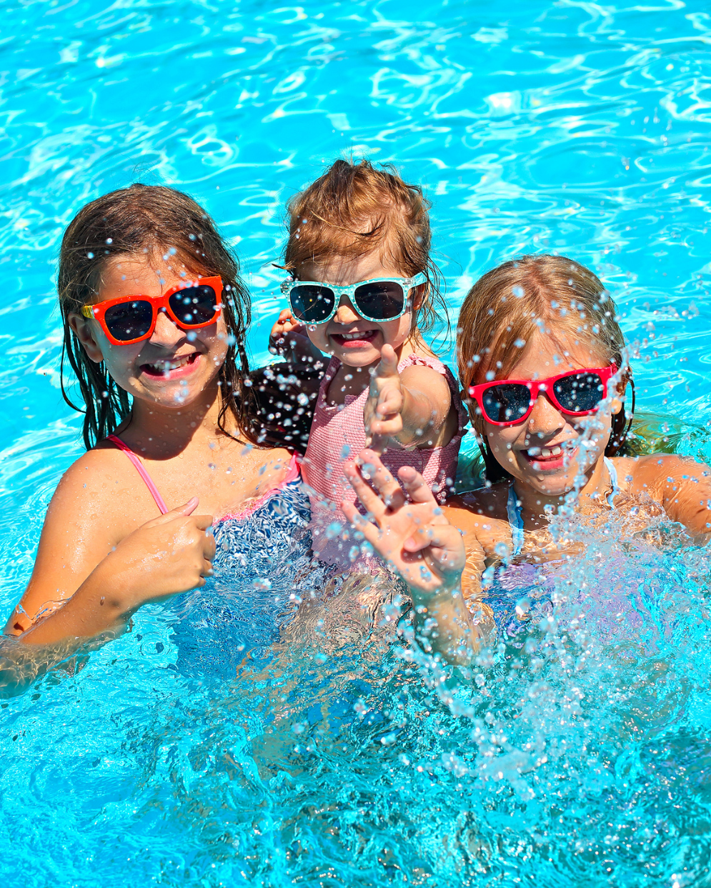 Children playing in swimming pool