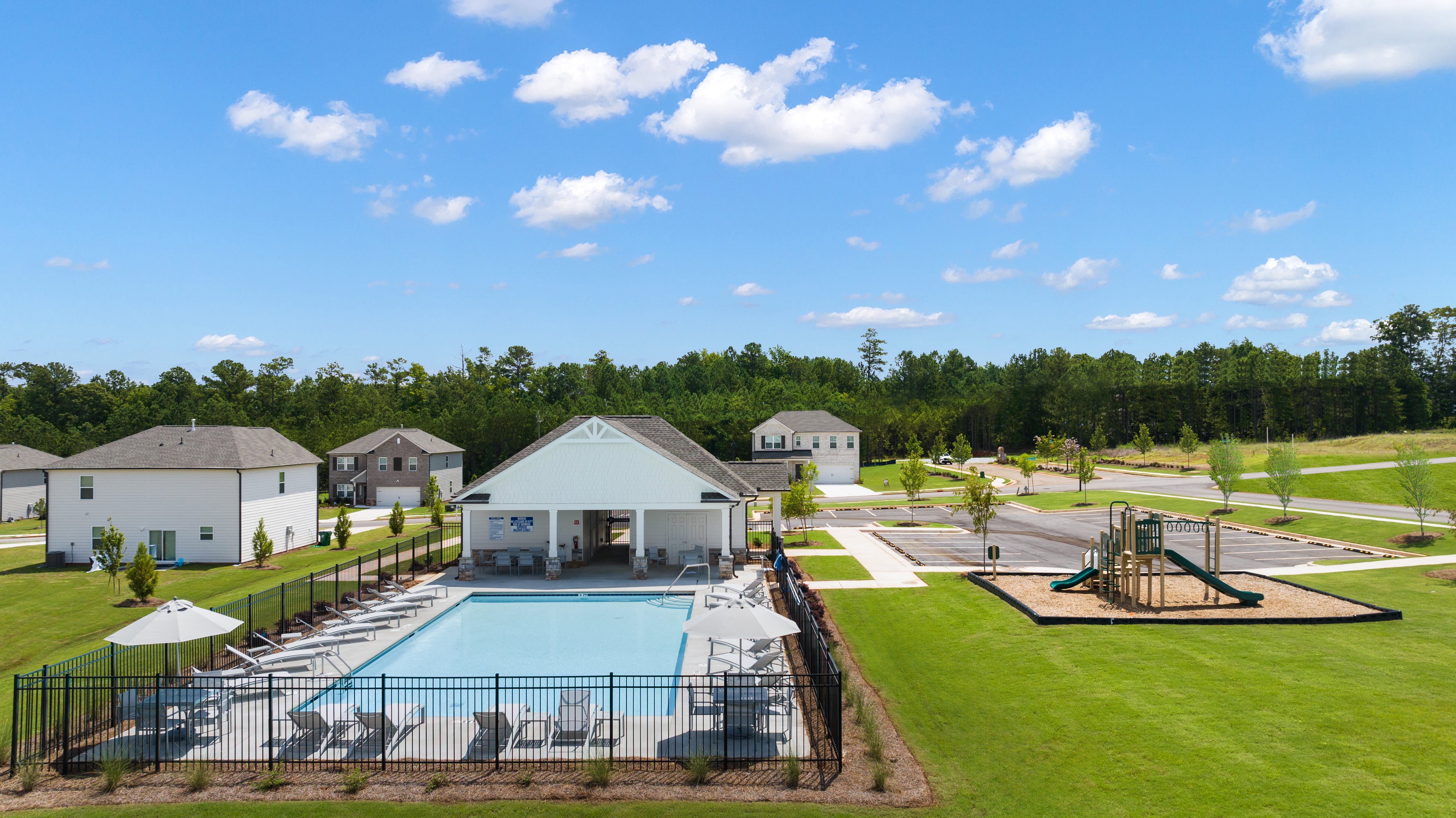 Image: Pool and playground amenities in Heritage Point community