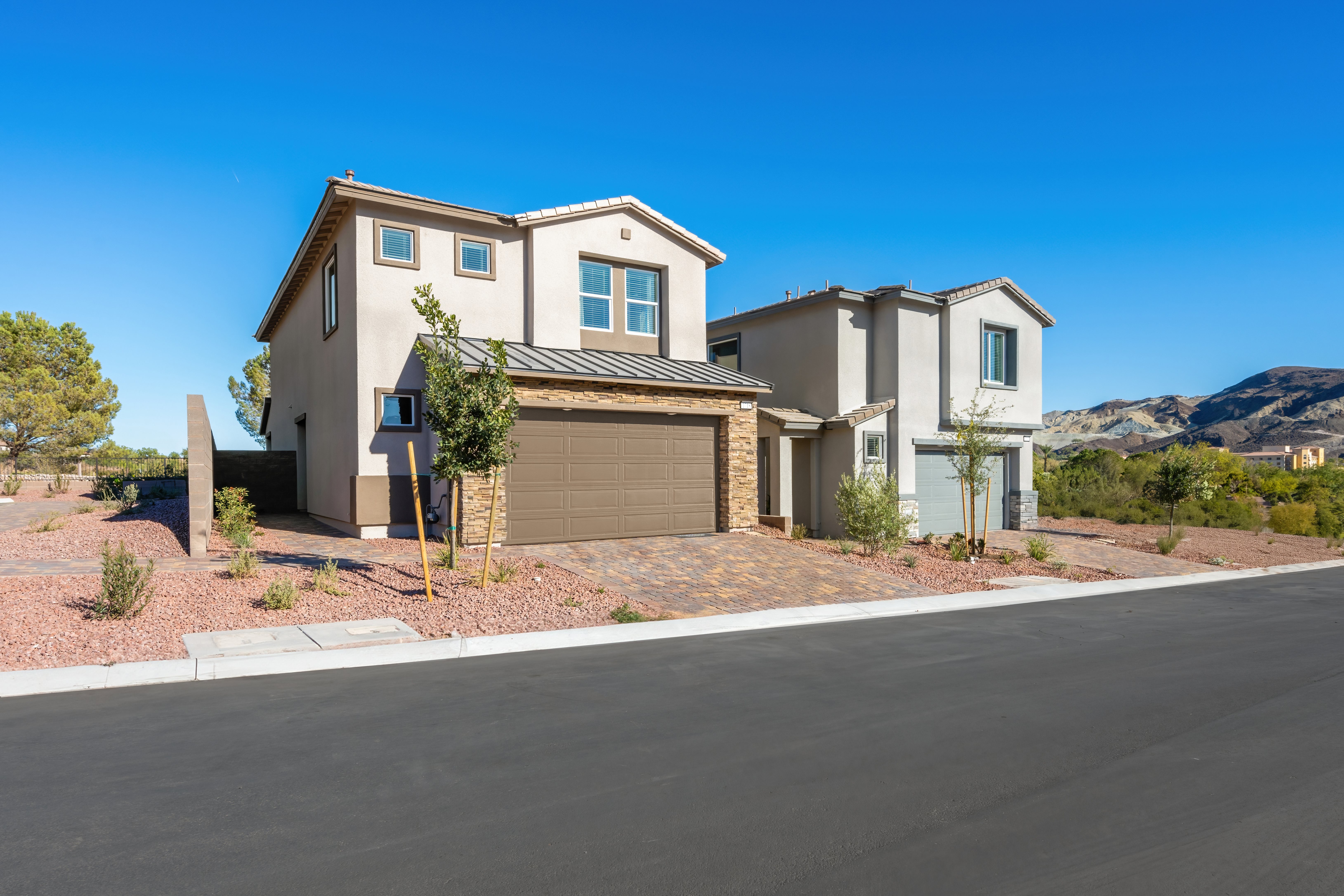 Street view of two model homes at Riviera Vista
