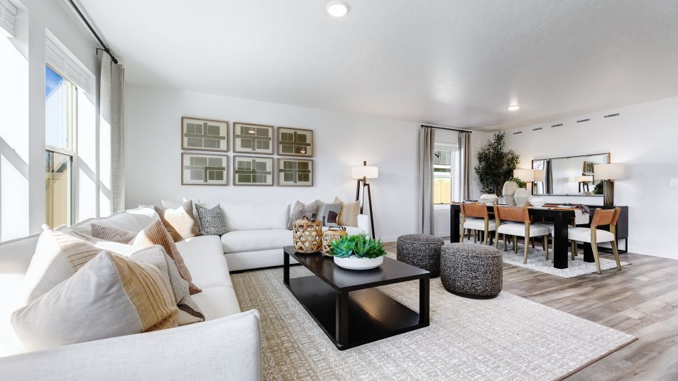 Furnished family room with the dining room visible