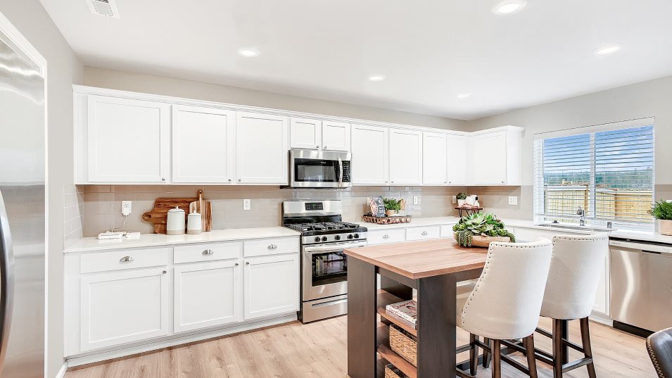 Kitchen with center island and lots of cabinetry