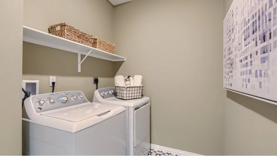 Laundry room with washing machine and dryer
