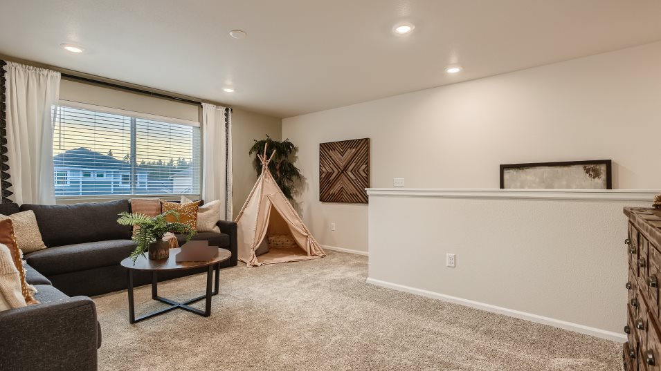 Loft space styled as a gathering area