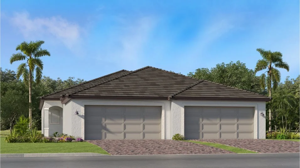Exterior with a hipped roofline and textured stucc