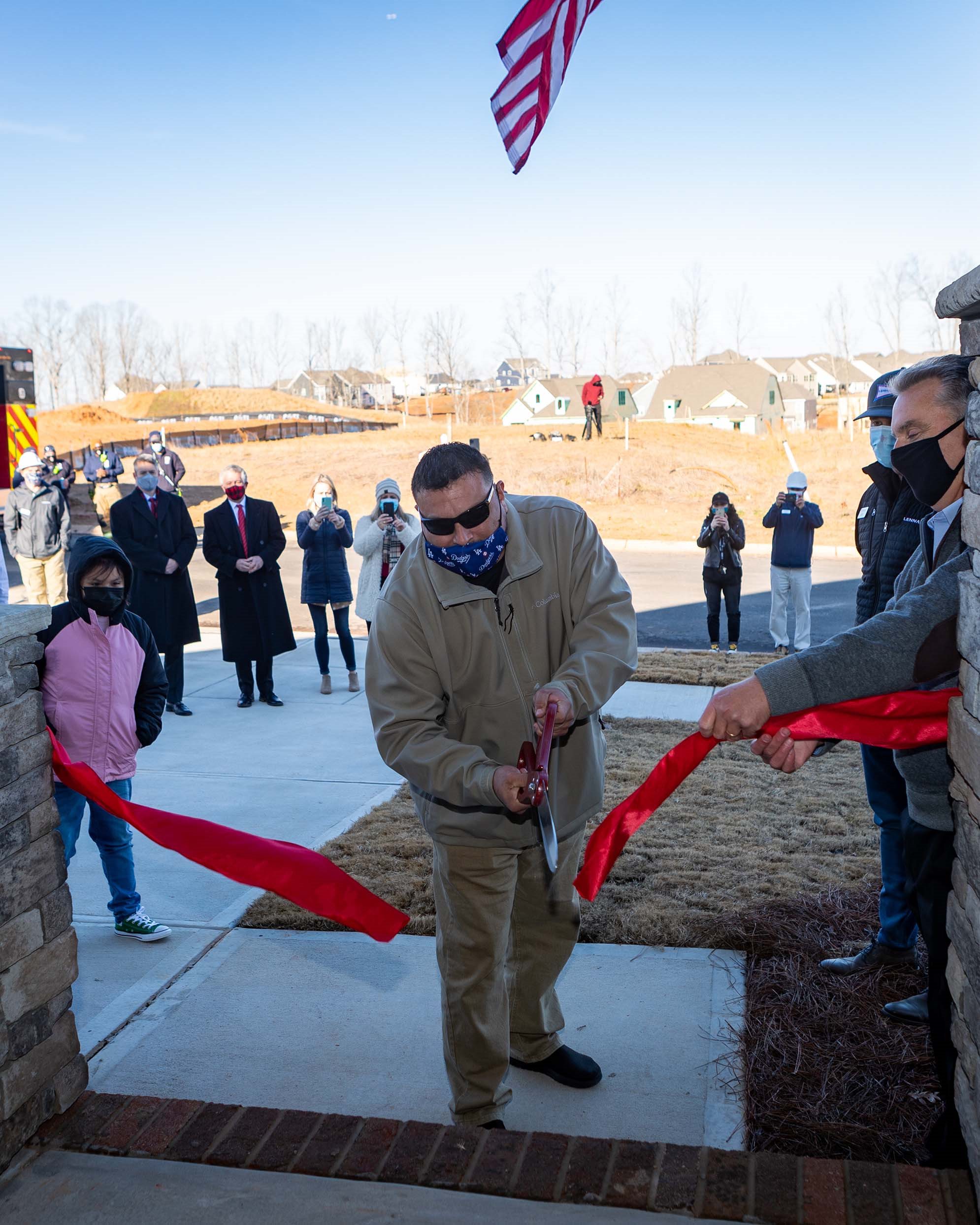 IMAGE: Ribbon cutting for Operation Finally Home Dedication