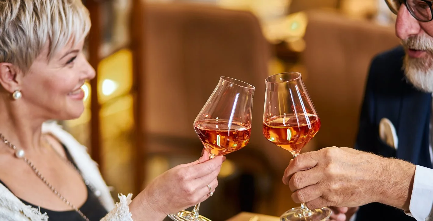 Couple enjoying a glass of wine together 