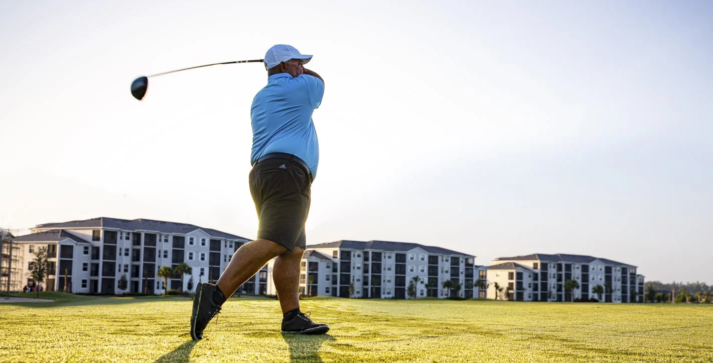 Man playing golf
