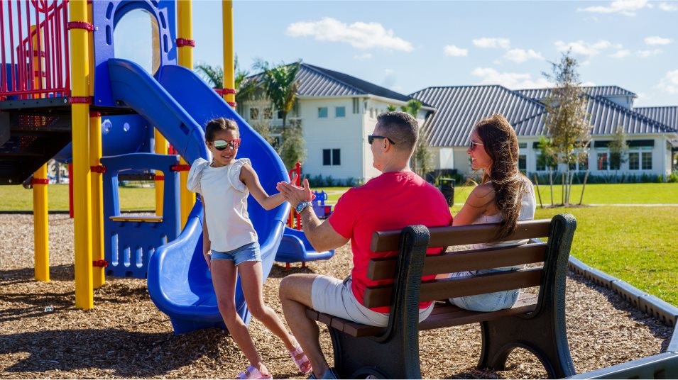 Family playing on the playground
