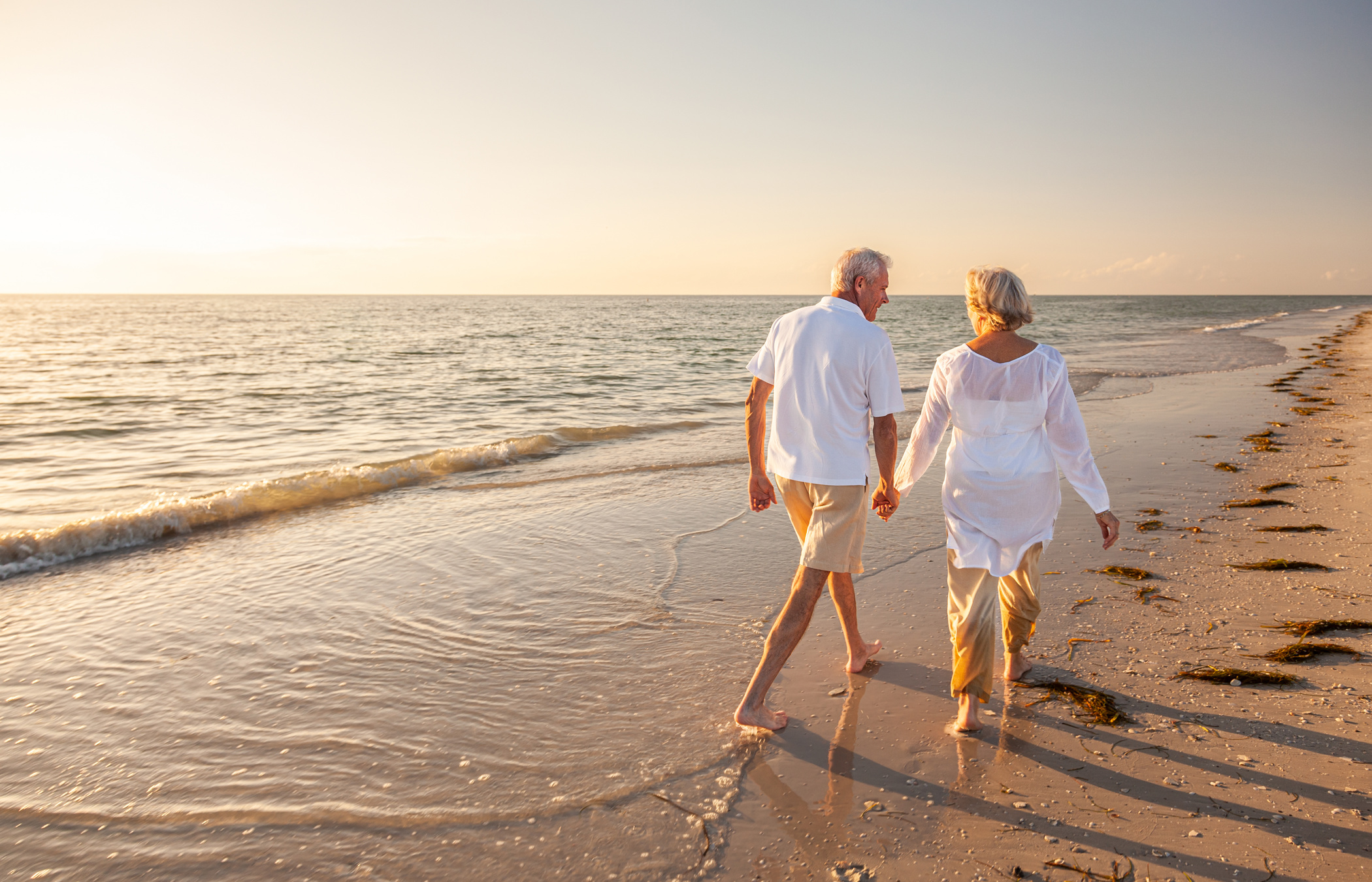 N Pic Active Adult Couple Beach Walk Sunset