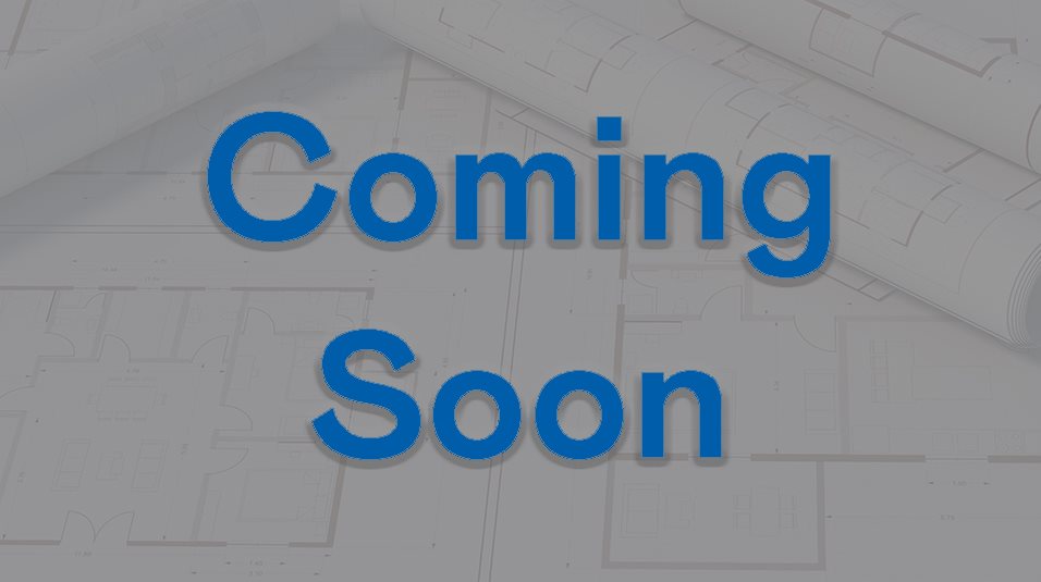 A blue print with text: "Coming Soon" written over it.