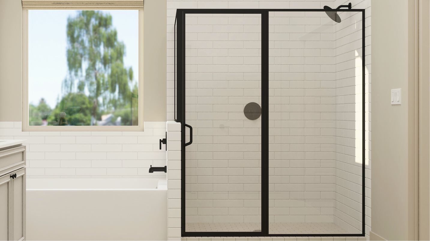 Walk-in shower with full-tile surround in the owner’s suite bathroom