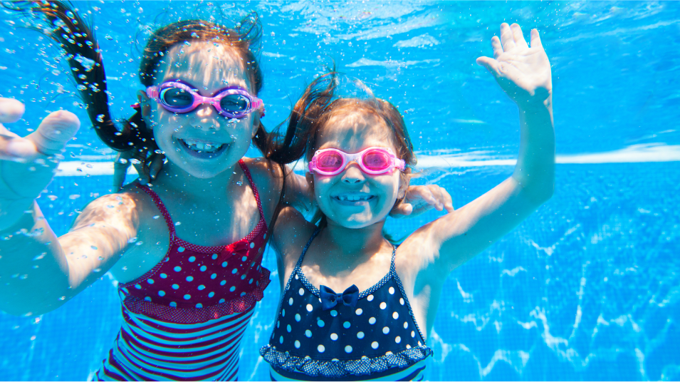 Kids playing in swimming pool at Legacy Ridge