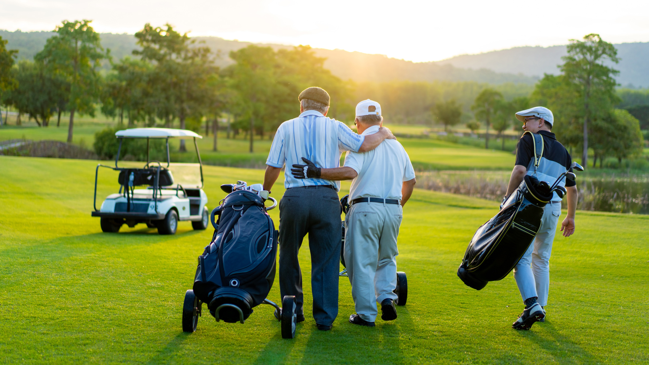 N Pic Sports Golf Players Walking Golf Bags