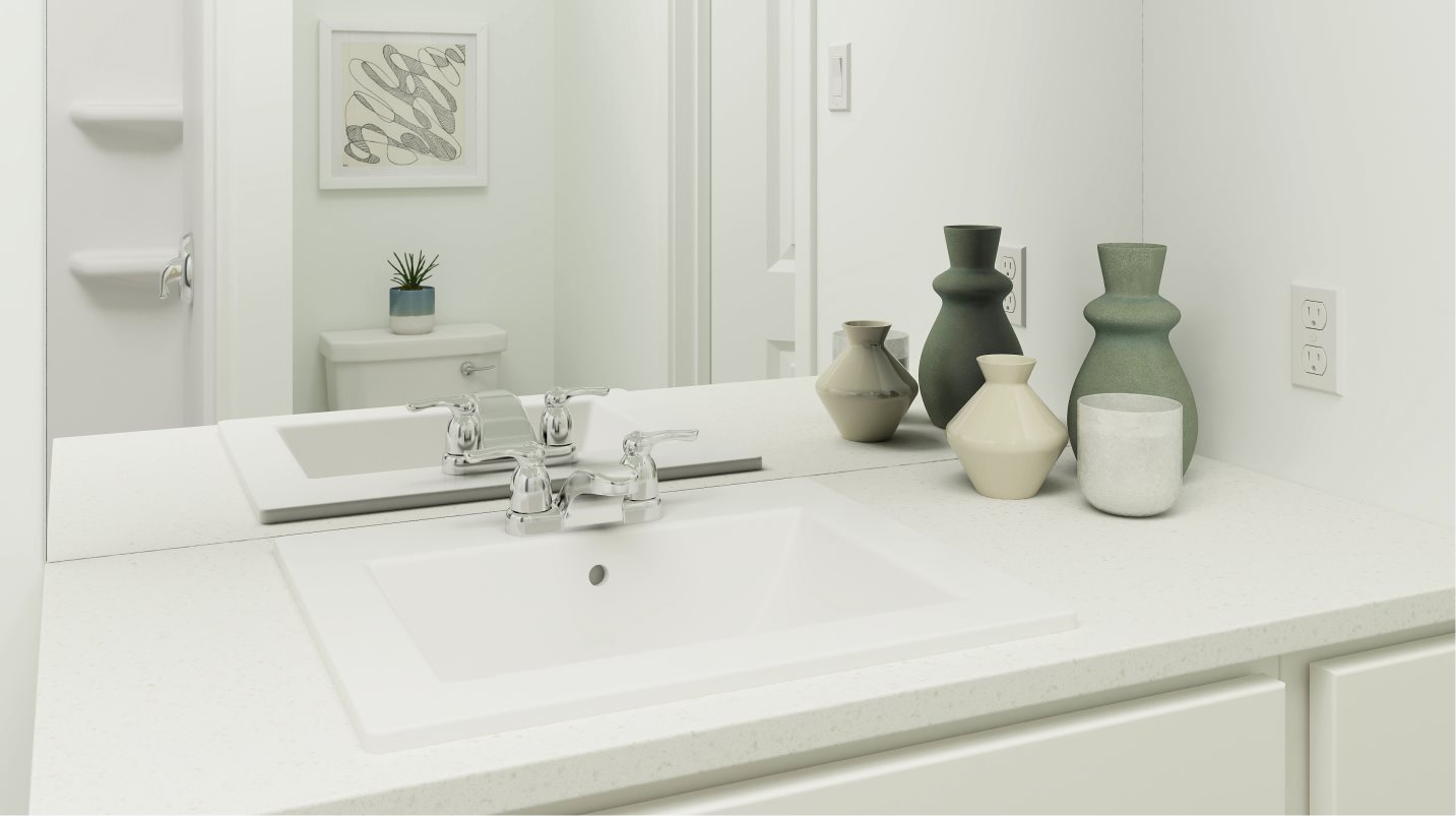 Quartz countertops and designer fixtures in the bathrooms