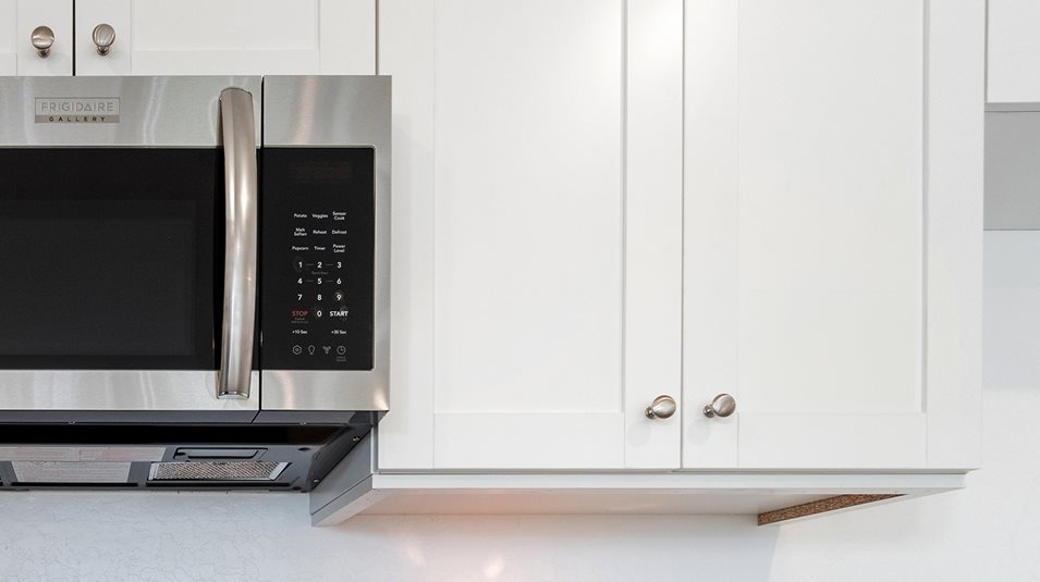 Cabinetry in White Linen in the kitchen for storage space