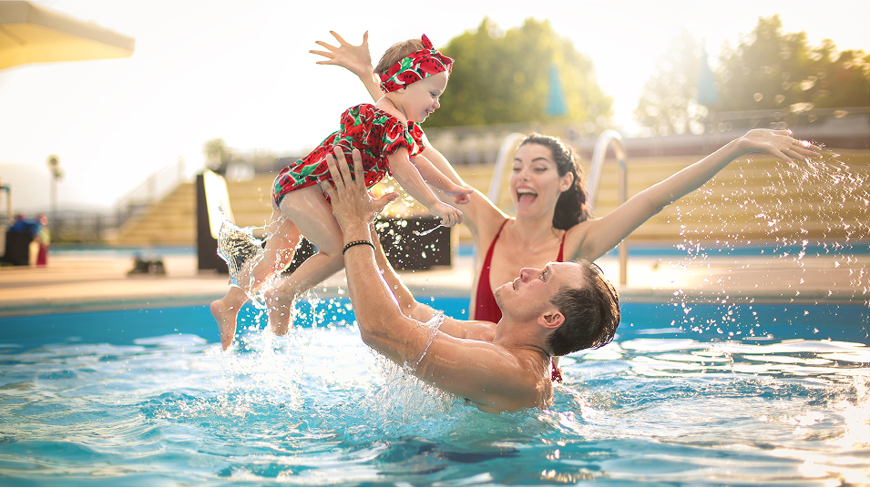 N Pic Family Outdoors Pool Parents Daughter Overhead Splashing